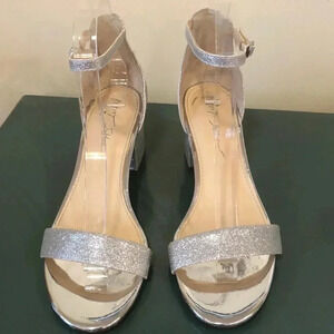 Betsey Johnson Mairi Champagne open toed sandal with rhinestone embellishment.